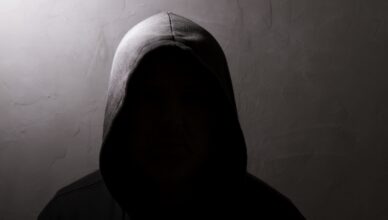 man with hidden face