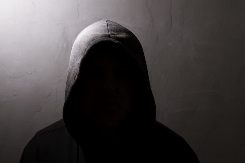 man with hidden face